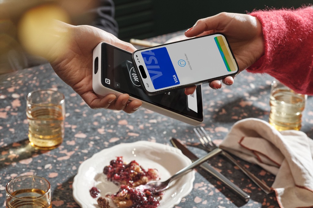 Square handheld contactless payment in a lifestyle setting