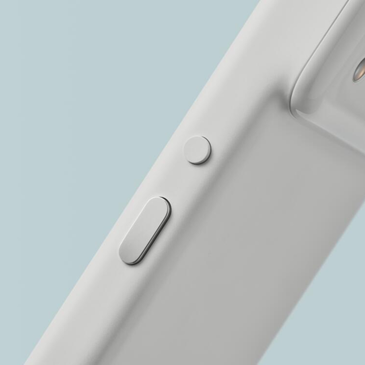 Square handheld device side detail and buttons